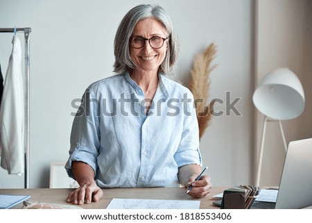 Similar – Image, Stock Photo Senior woman working in  carpentry