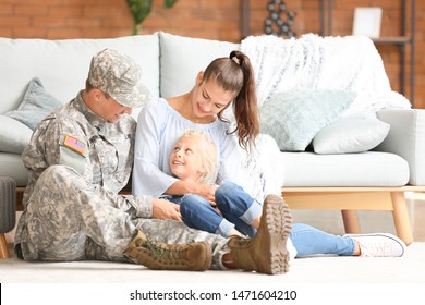 Happy Military Man With His Family At Home