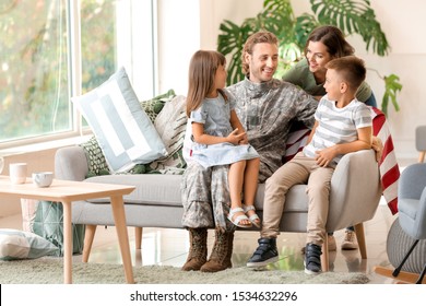 Happy Military Man With His Family At Home