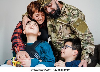 Happy Military Soldier Having Tender Moment With Family After Homecoming Reunion - Love And War Concepts - Focus On Veteran Man Face