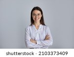 Happy millennial business woman in glasses posing with hands folded isolated on white, looking at camera, smiling. Confident female customer, young student girl, professional head shot portrait