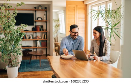 Happy Millennial Couple At Home.