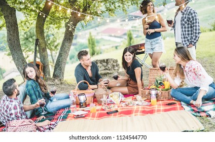 Happy Millennials Friends Haing Picnic Bbq Dinner Outdoor - Young People Eating And Drinking Wine In Summer Weekend Day - Friendship, Food, Hanging And Trendy Concept - Main Focus On Center Man Face