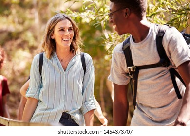 Happy Mixed Race Millennial Couple Hiking In A Forest Together, Waist Up, Close Up