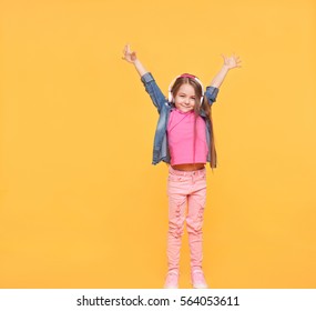 Happy Modern Kid With Hands Up