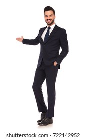 Happy Modern Young Business Man Presenting And Smiling On White Background