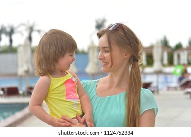 Happy mom and daughter, cute little baby girl. Happy family