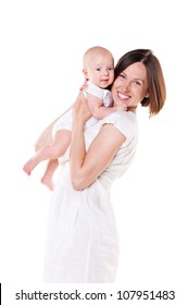 Happy Mom With Her Baby. Studio Shot Over White Background