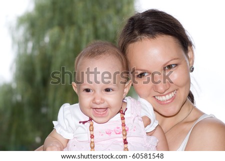 happy mom with a newborn for a walk