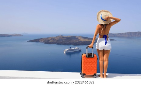 Happy moment with young woman tourist as orange the luggage in Santorini island,Greece  - Powered by Shutterstock
