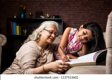 Happy Moments With Grandma, Indian/asian Senior Lady Spending Quality Time With Her Grand Daughter 