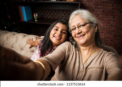 Happy Moments With Grandma, Indian/asian Senior Lady Spending Quality Time With Her Grand Daughter 