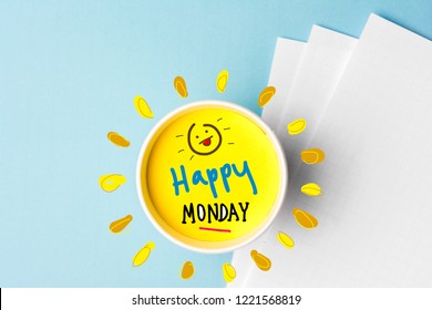 Happy monday quote and coffe cup on blue background. Time to break concept.