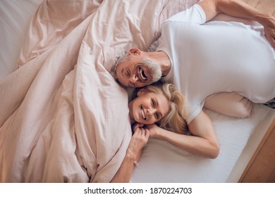 Happy morning. Mature couple resting together and feeling pleased - Powered by Shutterstock