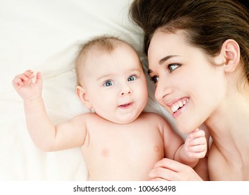 Happy Mother With Baby