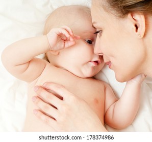 Happy Mother With Baby