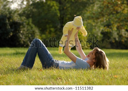 Similar – Eine weiße Frau mit einem schwarzen Baby.