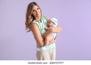 Happy Mother With Cute Little Baby On Color Background