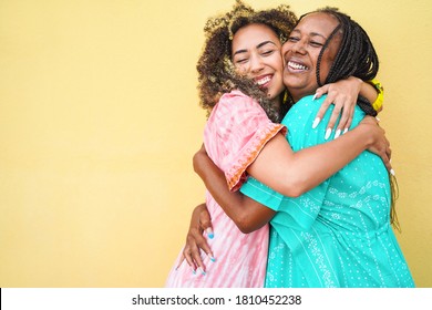 Happy mother and daughter hugging each others - Love and family concept