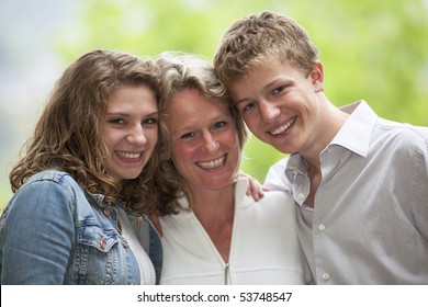 Happy Mother With Daughter And Son