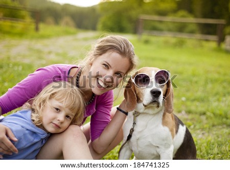 Similar – Foto Bild Blonder Labrador und junge Frau am Strand