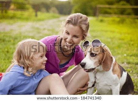 Similar – Foto Bild Blonder Labrador und junge Frau am Strand