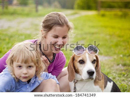 Similar – Foto Bild Blonder Labrador und junge Frau am Strand