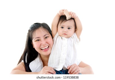 Happy Mother Having Fun With Baby Girl