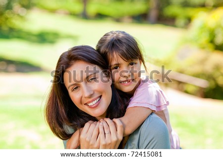 Similar – Image, Stock Photo Little boy kissing his mother on a field in summer