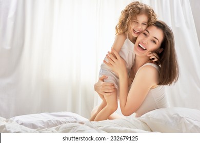 happy mother holding her child