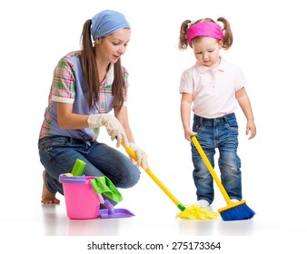 Happy Mother With Kid Cleaning Room And Having Fun