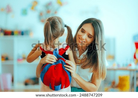 
Happy Mother Leaving her Little Kid at the Kindergarten. Moms saying goodbye when girl goes back to school
