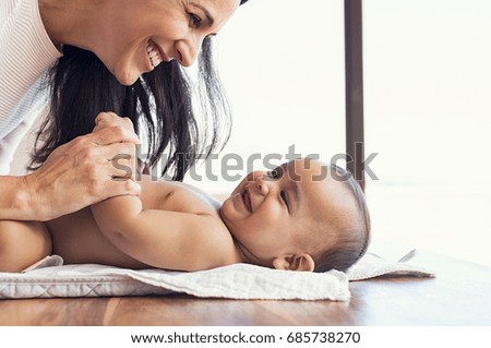 Similar – Image, Stock Photo Mother and toddler with mobile phone in hand