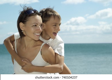 happy mother and son - Shutterstock ID 740104237