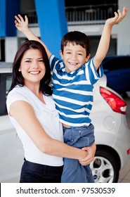 Happy Mother And Son Buying A Car