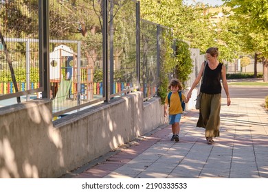 Happy Mother And Son Going To School.