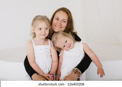 Happy Mother With Two Kids.