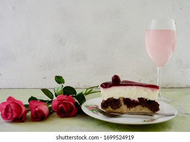 Happy Mother's Day To All Moms Around The World. Pink Flowers, Rose Wine And A Piece Of Red Cherry Cake. Celebrate Motherhood On This Special Day. Space For Copy.