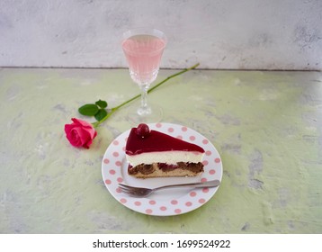 Happy Mother's Day To All Moms Around The World. Pink Flowers, Rose Wine And A Piece Of Red Cherry Cake. Celebrate Motherhood On This Special Day. Space For Copy.