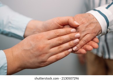 Happy Mother's Day. Senior And Young Holding Hands S For Comfort And Sympathy. Strong Connection Confidential Conversation