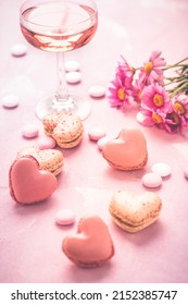 Happy Mothers Day - Sweet Macarons And Glass Of Rose Sparkling Wine With Flowers In Pink Tone