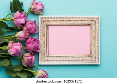 Happy Mother's Day, Women's Day, Valentine's Day Or Birthday Flat Lay Background. Beautiful Wooden Vintage Picture Frame, Fresh Pink Roses And Copy Space.