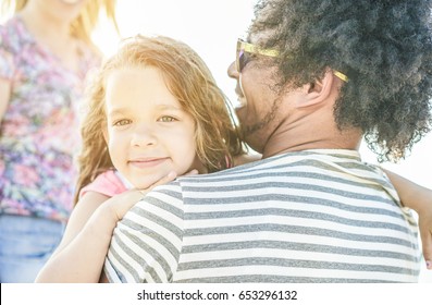 Happy Multi Ethnic Family Having Fun On The Beach - Diverse Culture Couple Playing With Daughter On Summer Vacation - Travel,love,holidays Concept - Soft Focus On Child Eye, Mouth , Nose - Warm Filter