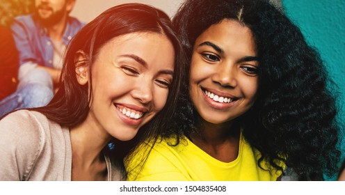 Happy Multi Ethnic Girl Friends Sitting Stock Photo (Edit Now) 1504835408