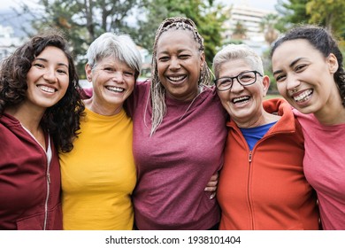 Happy multi generational women having fun together - Multiracial friends smiling on camera after sport workout outdoor - Main focus on african female face - Shutterstock ID 1938101404