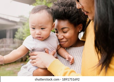 Happy Multicultural Family Standing In Front Of The House During Covid19 Lockdown