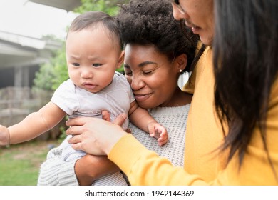 Happy Multicultural Family Standing In Front Of Their House During Covid19 Lockdown