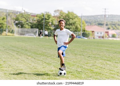 A Happy Multicultural Hispanic Soccer Player Outdoor In Sunny Day