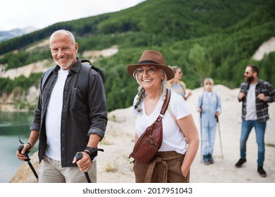 Happy Multigeneration Family On Hiking Trip On Summer Holiday, Walking.