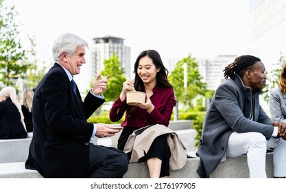 Happy Multiracial Business People Having A Lunch Break Outside Office